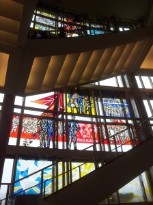 stained glass window with staircase in front of it