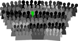 cardboard cutout silhouettes of people in grey and black, but one figure is bright green, standing out